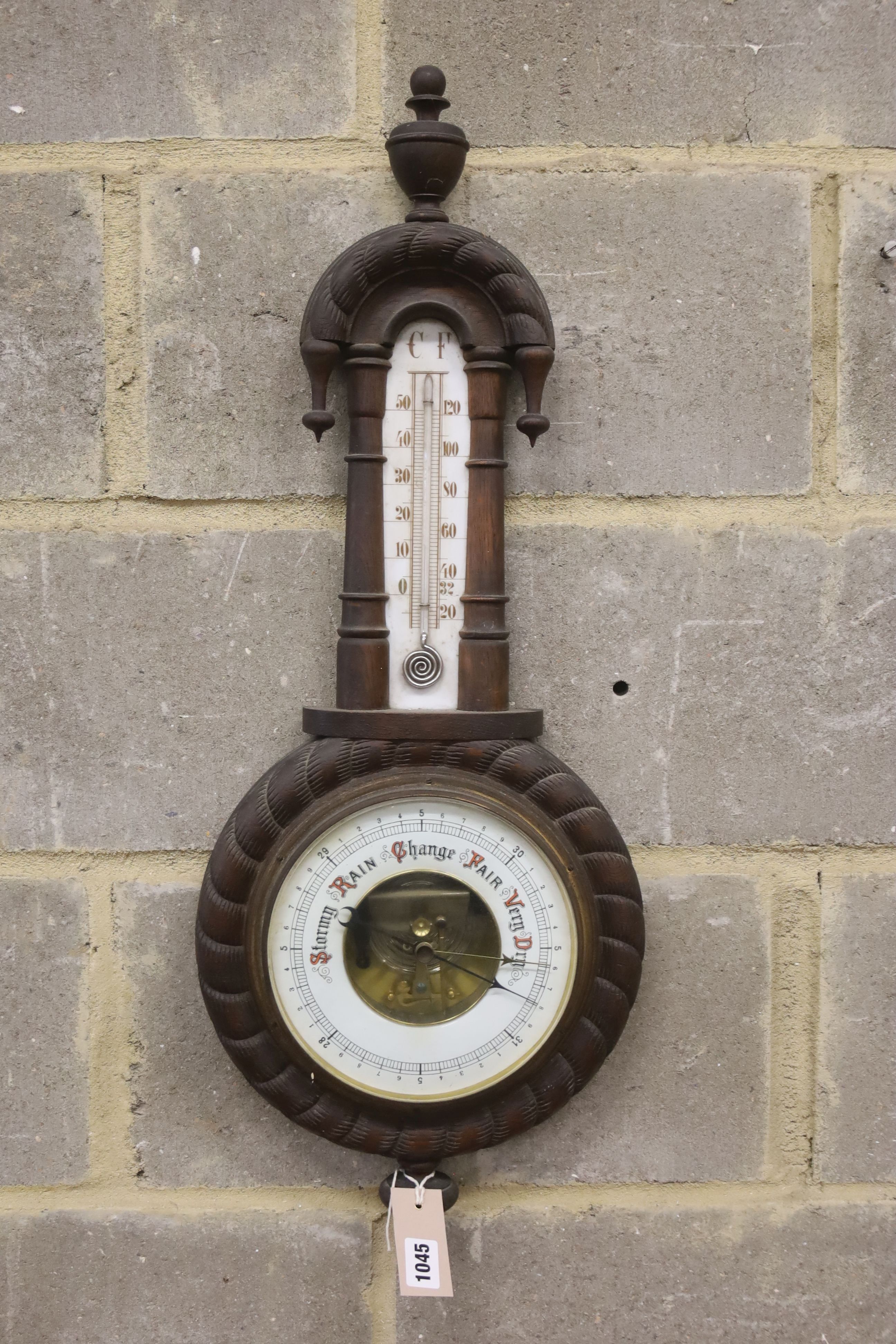 A late Victorian aneroid barometer / thermometer, height 76cm